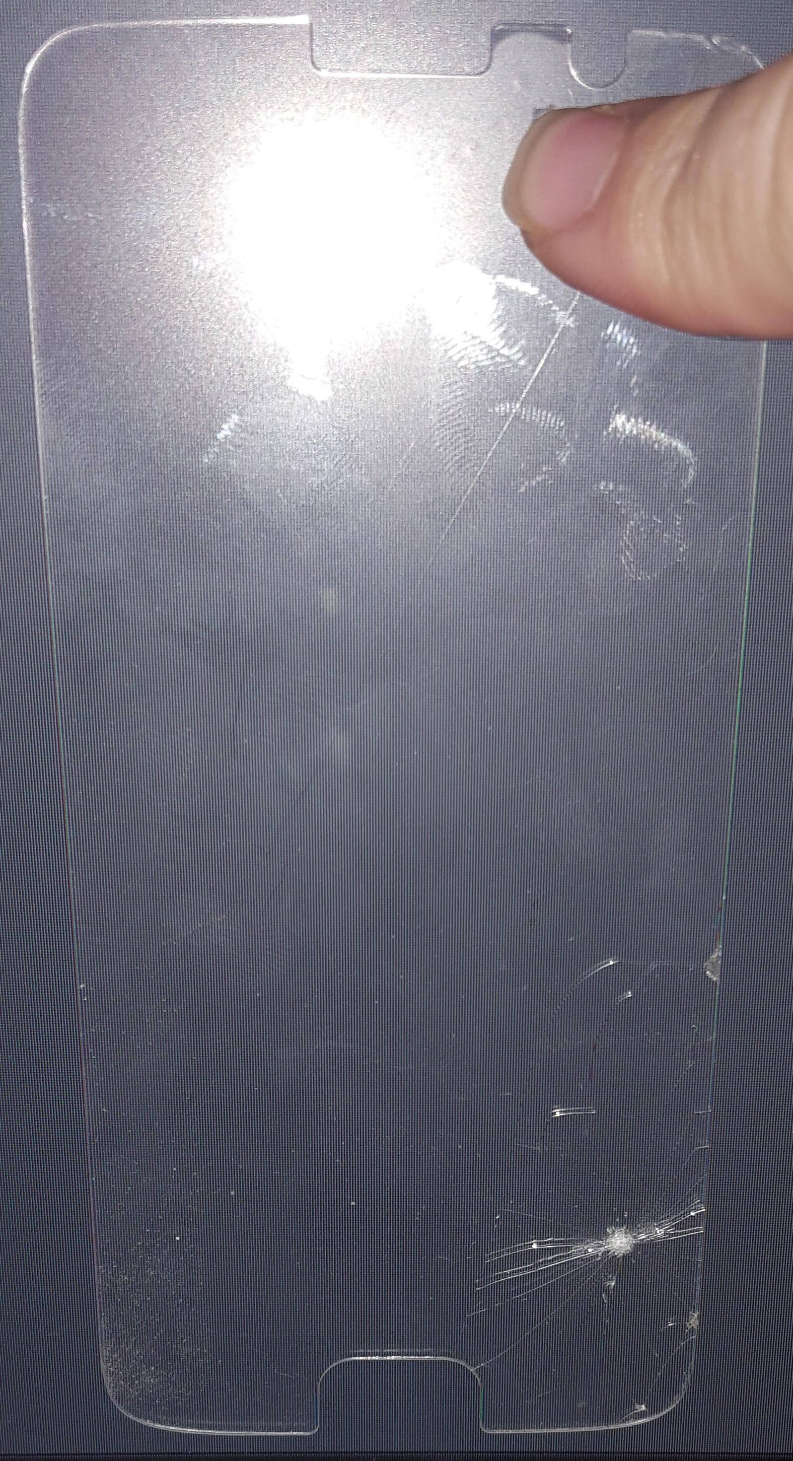 Shattered screen protector, click to load a larger version