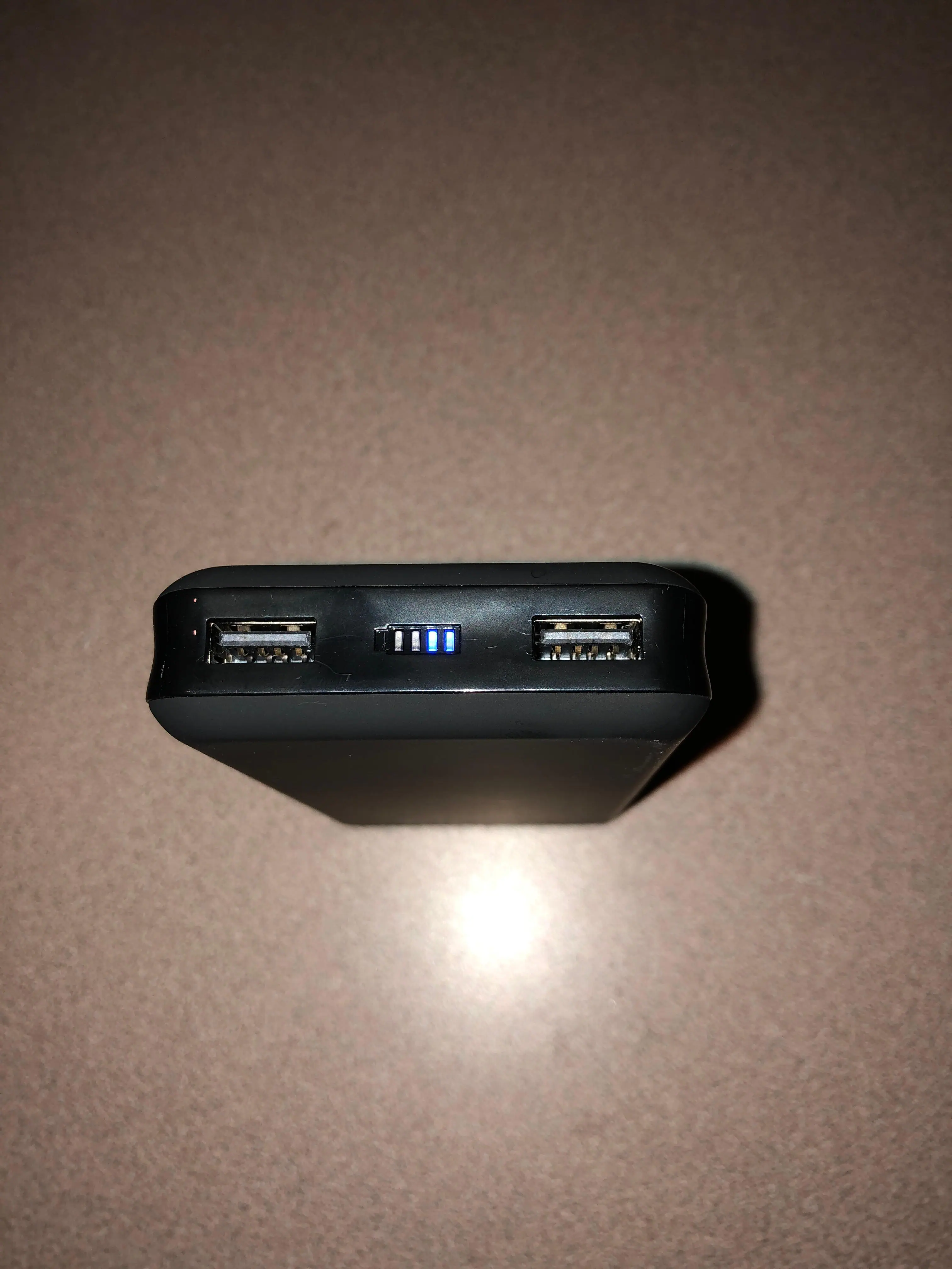 Two ports and charging port on the top-side., click to load a larger version