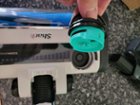 The air freshener; it goes in on top of the brush head, click to load a larger version