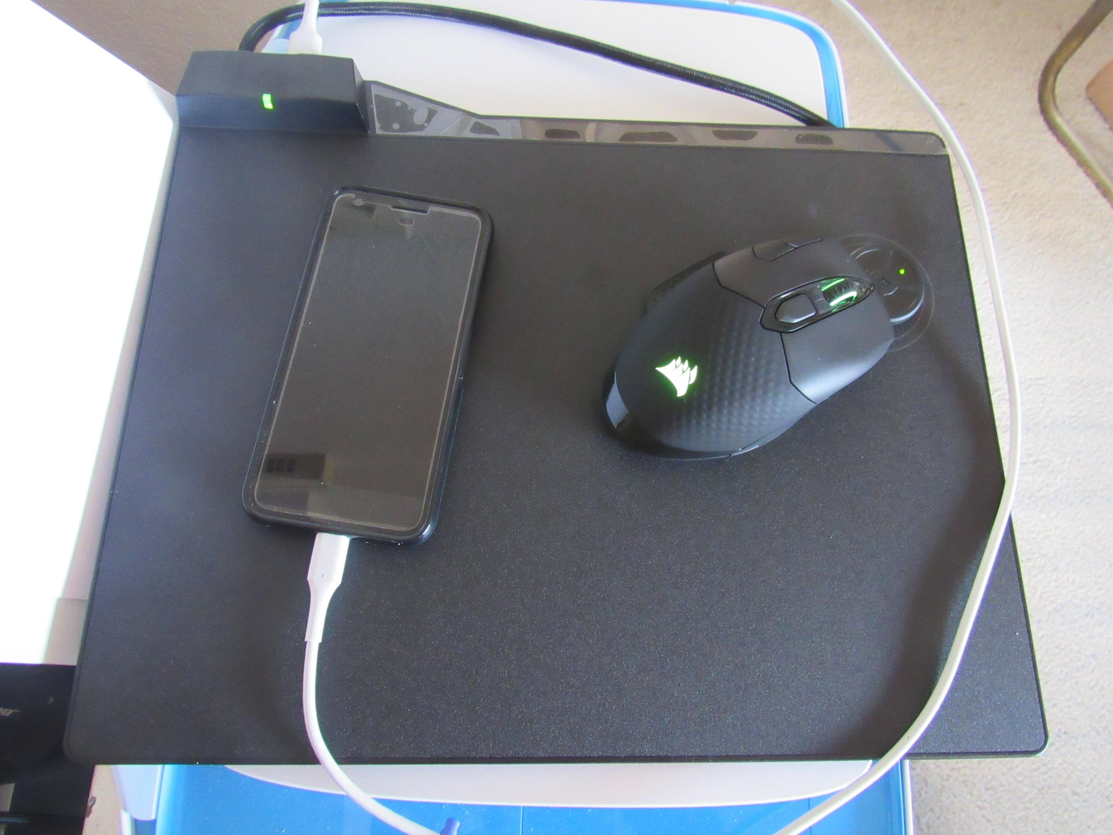 Mouse pad on top of printer, click to load a larger version