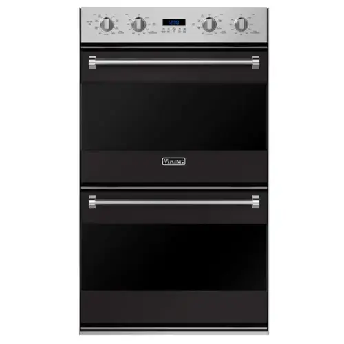 The text on the image reads "VIKING 12:00 9 9". This suggests that the oven is a Viking brand and is set to 12:00, with the oven light on. The numbers "9 9" could be a reference to the oven's temperature or cooking time, but without more context, it is not possible to determine their exact meaning.