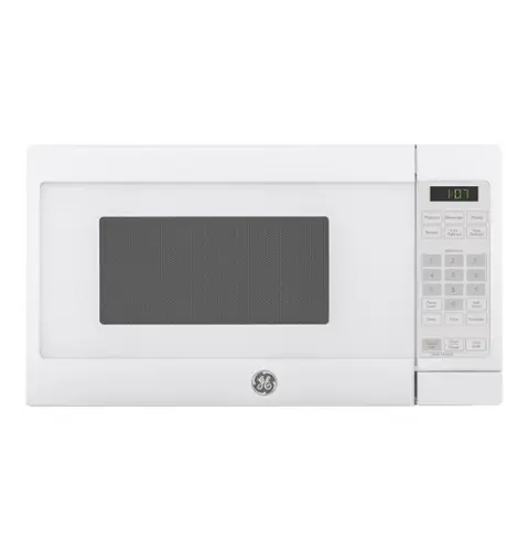 The image shows a white microwave with the time 1:01 displayed on the front. The microwave is made by Ge, and it is a small, compact appliance.