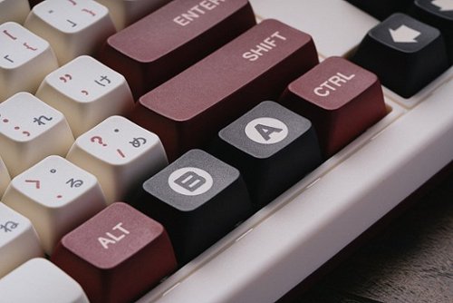 8BitDo Retro Mechanical Keyboard - Fami Edition BUY IN UAE