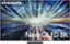 The image features a Samsung Neo QLED 8K television, which is the largest text in the image. The television is displayed in a large, brightly lit room, with a blue and green background. The screen is filled with a colorful and dynamic scene, showcasing the high-quality display capabilities of the Neo QLED 8K TV.