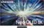The image features a Samsung Neo QLED 8K television, which is the largest text in the image. The television is displayed in a large, brightly lit room, with a blue and green background. The screen is filled with a colorful and dynamic scene, showcasing the high-quality display capabilities of the Neo QLED 8K TV.
