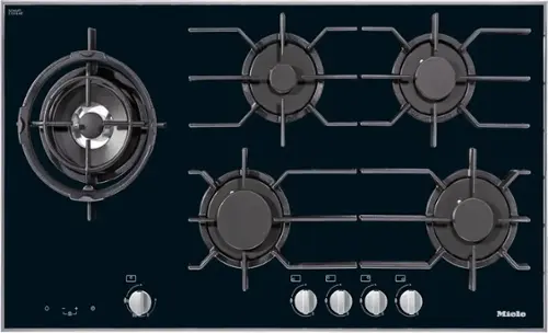 The image shows a stove with four burners and a clock. The stove is made by Miele, a well-known brand for high-quality appliances. The clock is located on the left side of the stove, and the burners are arranged in a diamond pattern, with one burner in the center and three others surrounding it. The stove is designed with a modern aesthetic and is likely to be a popular choice for home cooking enthusiasts.