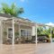 Yardgrace - 12'x 16' Outdoor Wall Mounted Lean-to Gazebo, Heavy Duty Sloped Roof Metal Awning for Patio, Decks & Backyard - White-Front_Standard