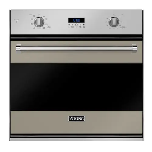 The image features a Viking oven with a digital clock displaying the time as 12:00. The oven is a stainless steel appliance, and the clock is located on the front of the oven. The oven is likely a part of a larger kitchen setup, providing a convenient way to keep track of time while cooking or baking.