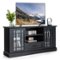 Gymax - Farmhouse TV Stand for TVs up to 70'' Media Center w/ Glass Doors Cubbies & Drawer - Black-Front_Standard