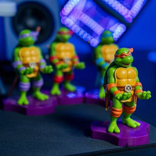 Cable Guys by Exquisite Gaming Cable Guys: TMNT - Michaelangelo Earbud & Phone Holder HOW TO BUY